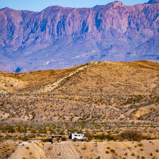 A camper parked by the side of the road in Big Bend National Park.