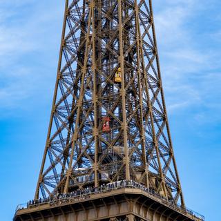 Telephoto of elevators in the Eiffel Tower.