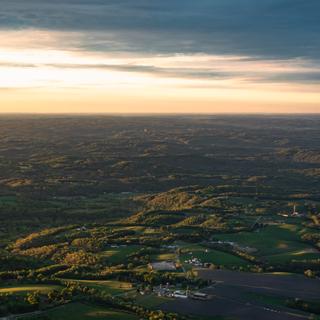 Sunset takeoff from Pittsburgh; flying west, facing north.