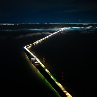 San Mateo Bridge at night on approach to SFO.